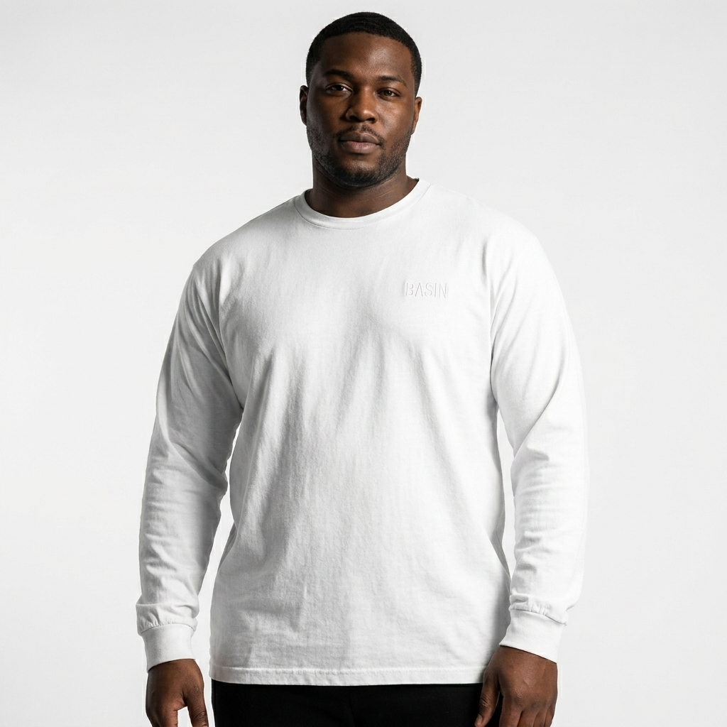 Garment-Dyed Heavyweight Long Sleeve Shirt worn by a curvy Black male fashion influencer, workwear utility styling, studio lookbook — custom garment-dyed heavyweight long sleeve shirt