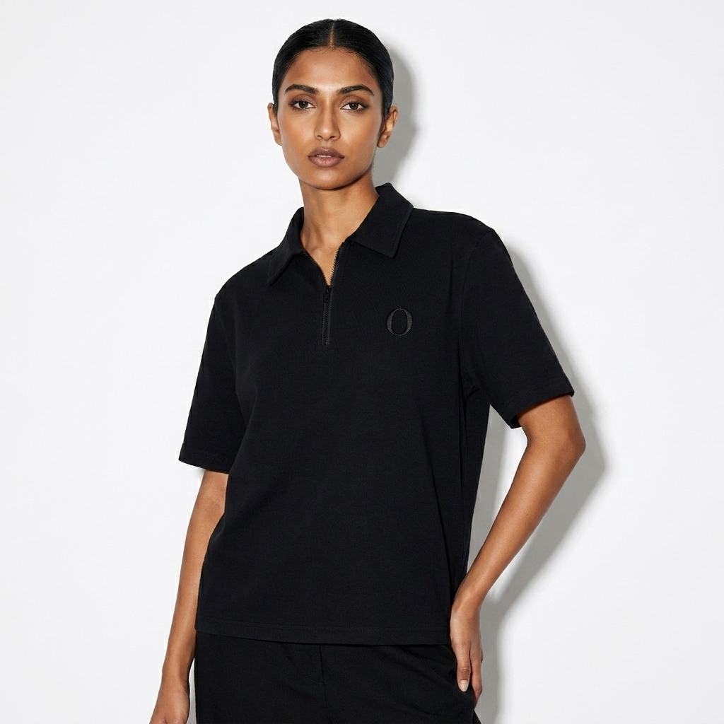 Half-Zip Cotton Polo Shirt worn by a lean South Asian female fashion influencer, sporty athleisure styling, studio lookbook — custom half-zip cotton polo shirt