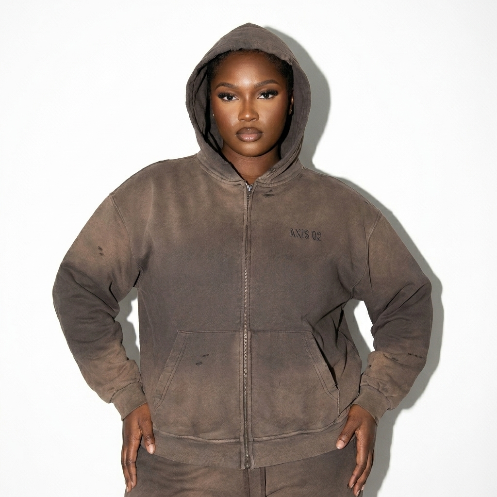 Hand-Frayed Sunfade Zip Hoodie worn by a curvy West African female fashion influencer, minimalist luxury styling, studio lookbook — custom hand-frayed sunfade zip hoodie