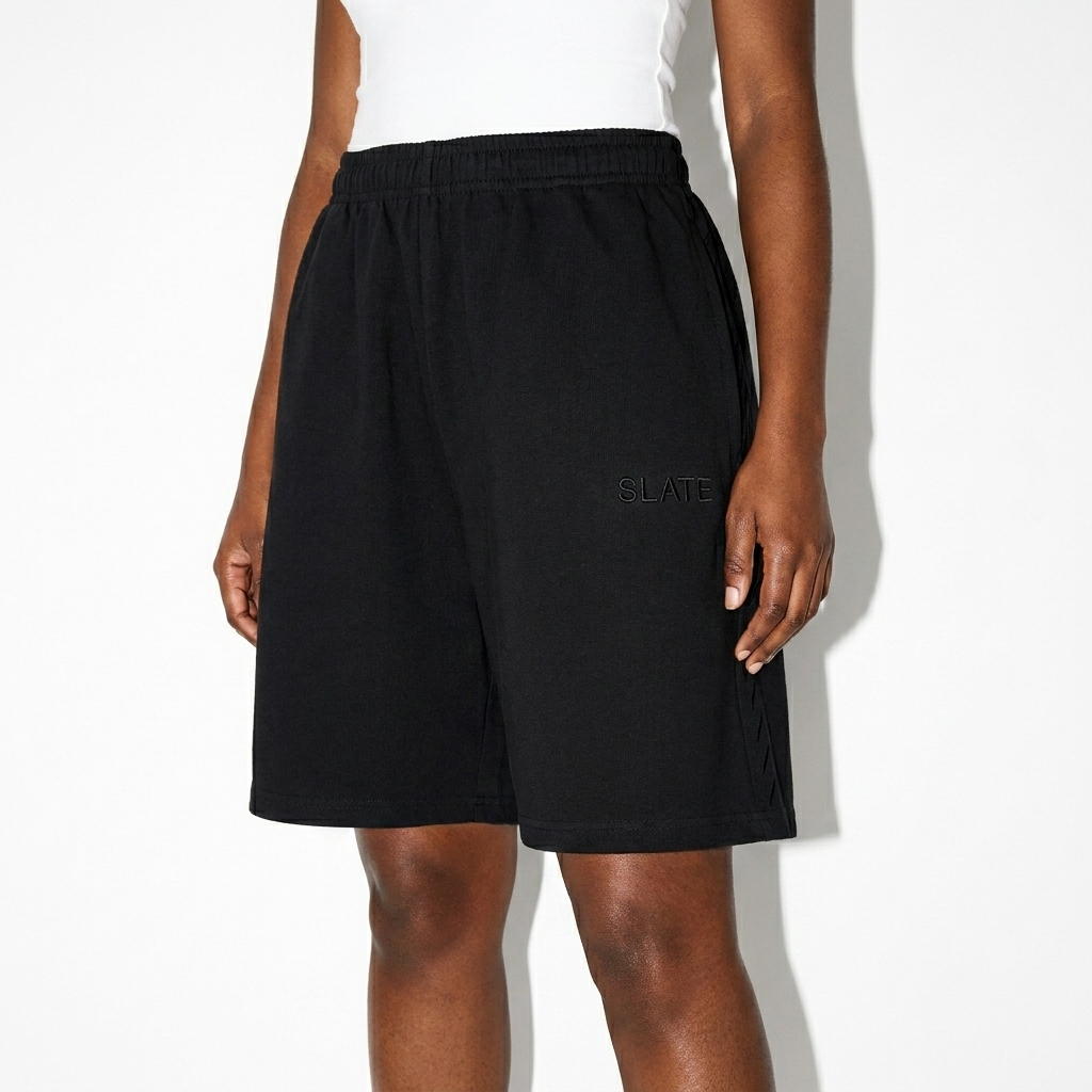 Heavyweight Cotton Shorts worn by a petite West African female fashion influencer, y2k revival styling, studio lookbook — custom heavyweight cotton shorts