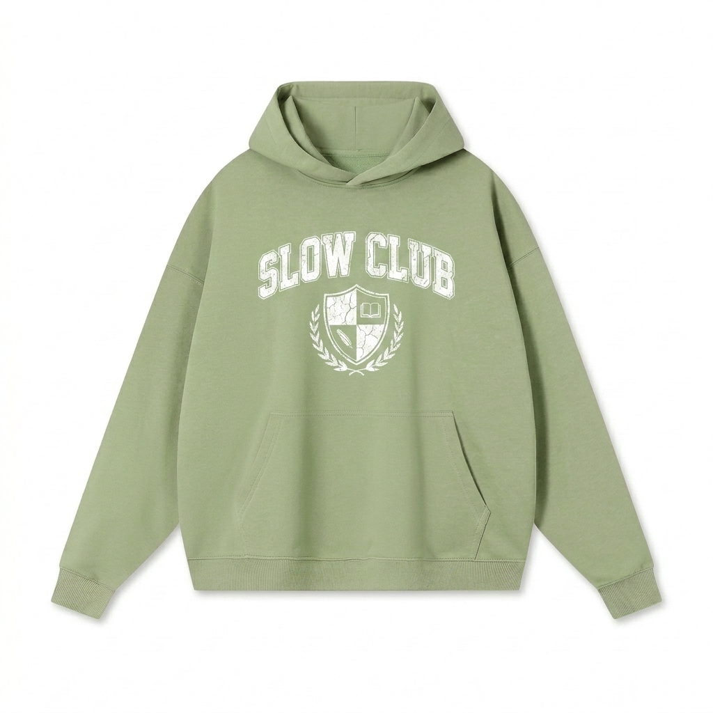 Custom Heavyweight Drop-Shoulder Hoodie design direction 3: Collegiate Heritage Emblem featuring the SLOW CLUB wordmark
