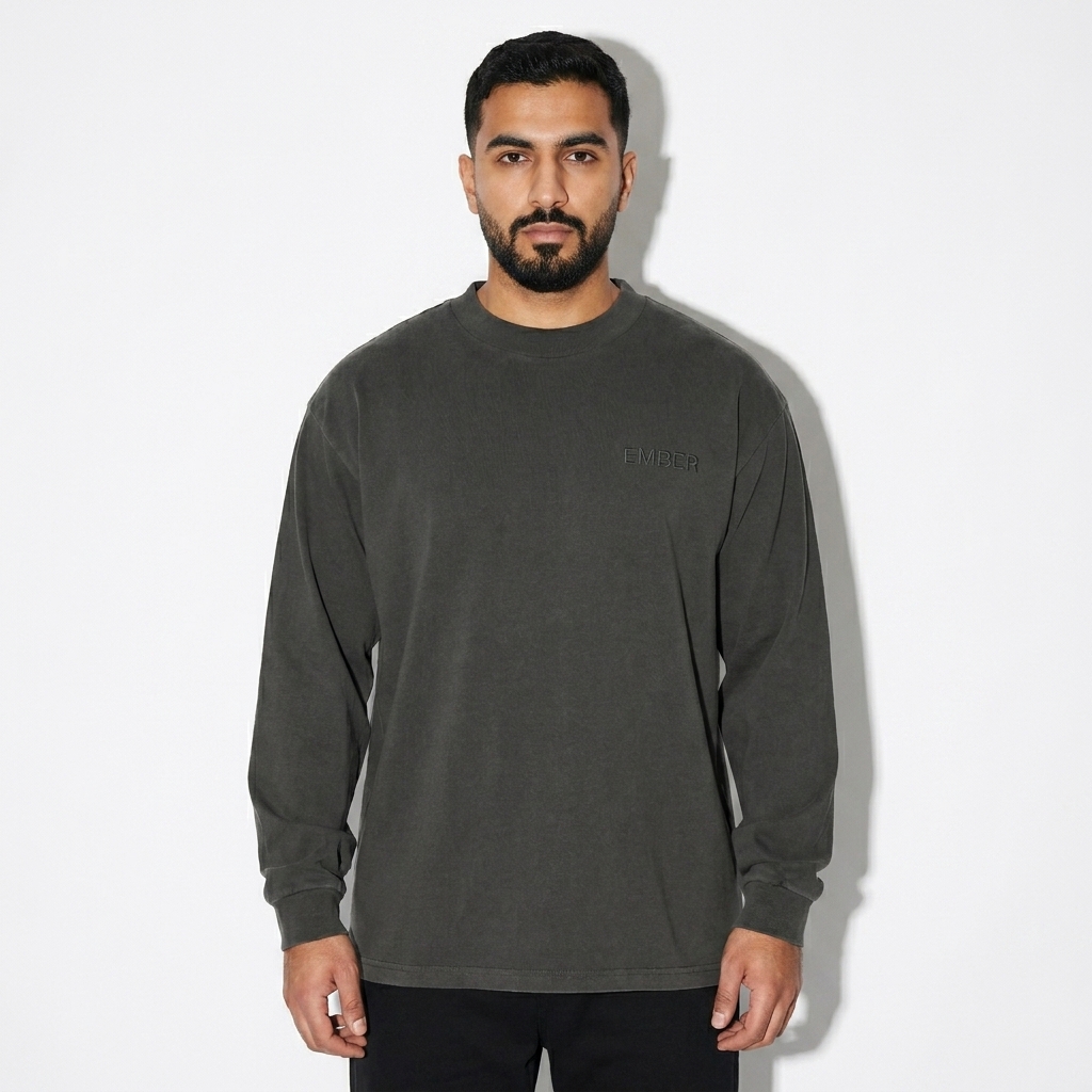 Heavyweight Drop Shoulder Long Sleeve worn by a mid-size Middle Eastern male fashion influencer, clean-girl minimal styling, studio lookbook — custom heavyweight drop shoulder long sleeve