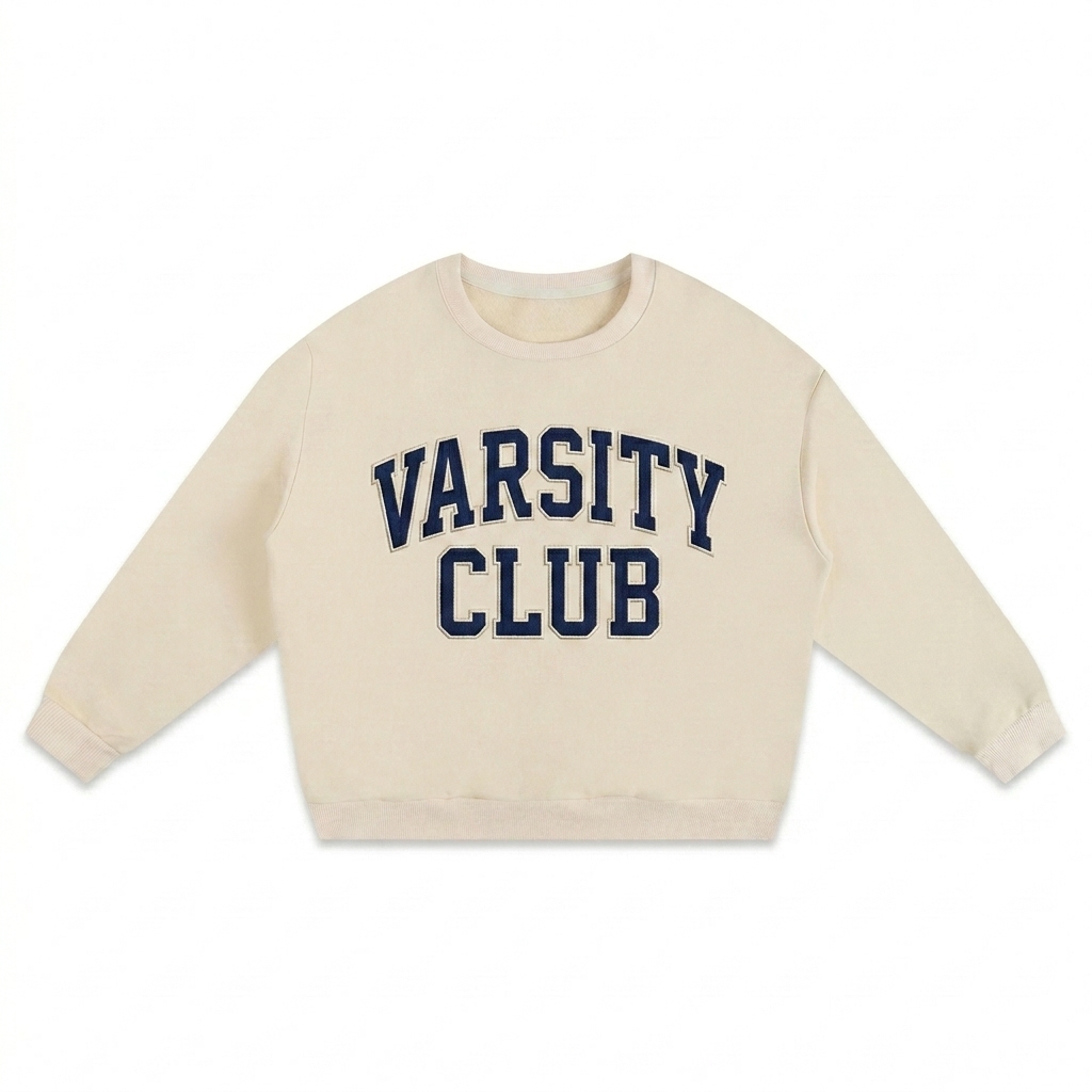 Custom Heavyweight Drop-Shoulder Sweatshirt design direction 3: Retro Collegiate Emblem featuring the VARSITY CLUB wordmark
