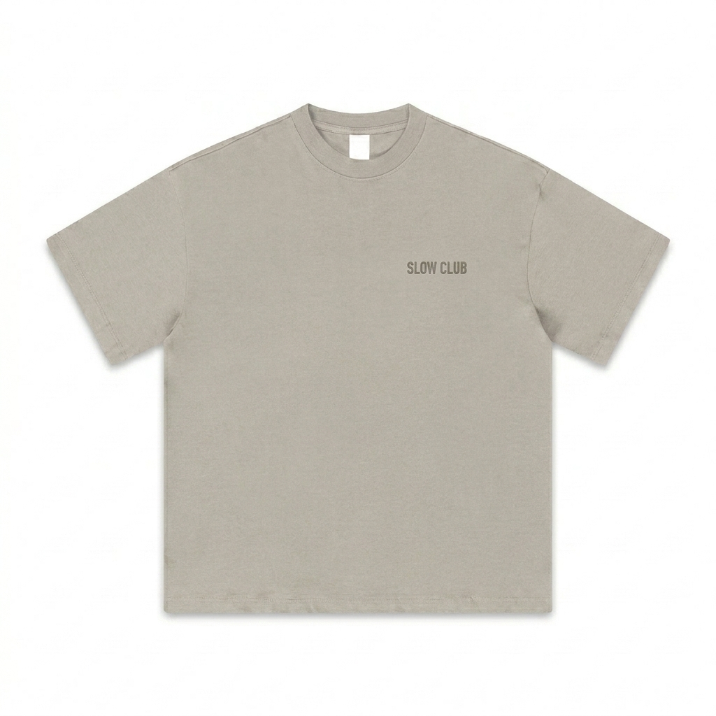 Custom Heavyweight Earth Tone T-Shirt design direction 1: Tonal Minimalist Wordmark featuring the SLOW CLUB wordmark