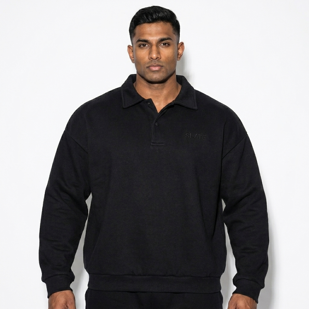Heavyweight Fleece Polo Sweatshirt worn by a athletic muscular South Asian male fashion influencer, editorial avant-garde styling, studio lookbook — custom heavyweight fleece polo sweatshirt
