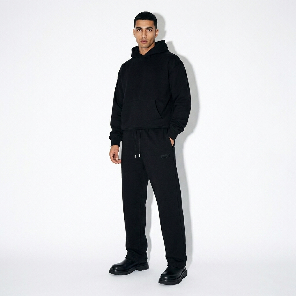 Heavyweight Fleece Straight Leg Pants worn by a lean Middle Eastern male fashion influencer, workwear utility styling, studio lookbook — custom heavyweight fleece straight leg pants