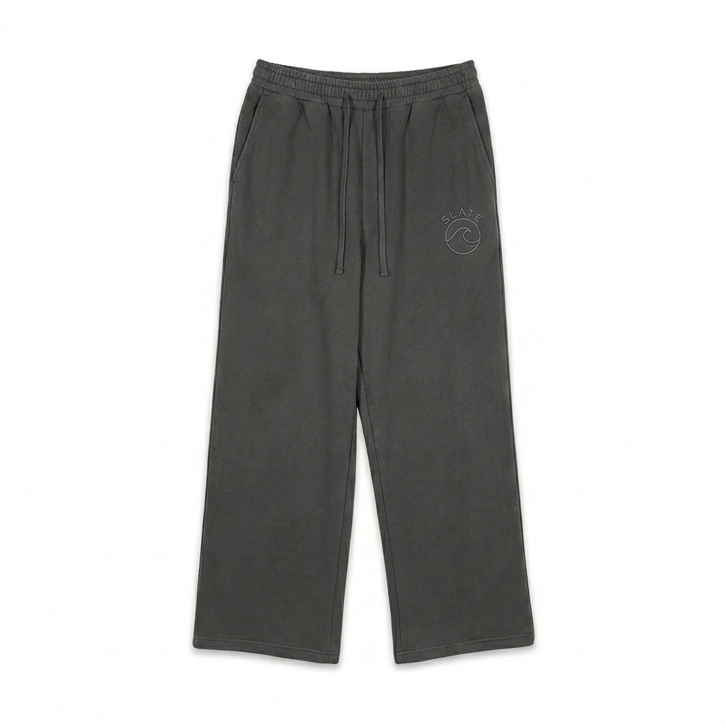 Custom Heavyweight Fleece Sweatpants design direction 2: Minimalist Tonal Emblem featuring the SLATE wordmark