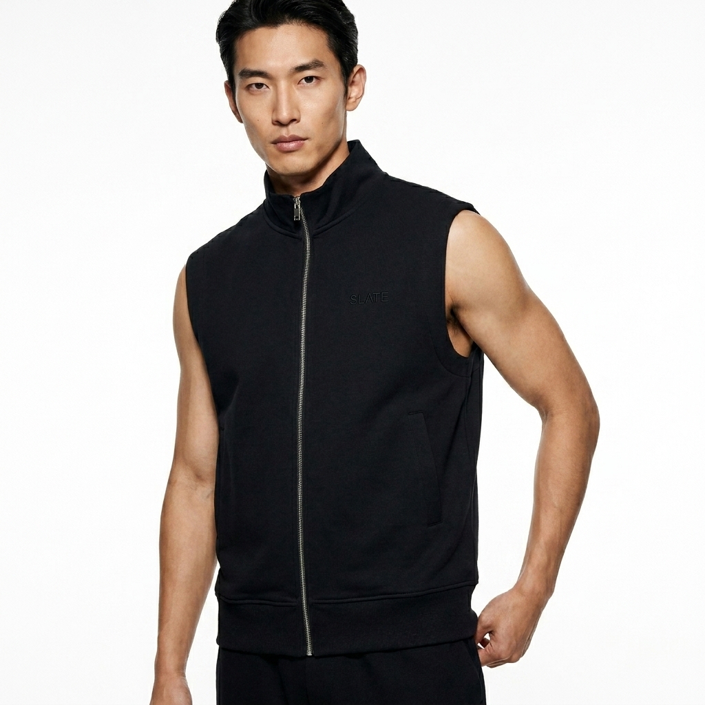Heavyweight Full-Zip Vest worn by a lean Japanese male fashion influencer, downtown streetwear styling, studio lookbook — custom heavyweight full-zip vest