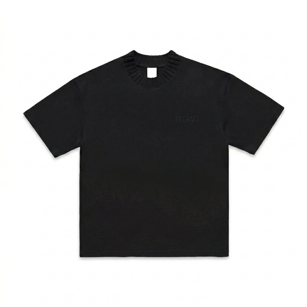 Custom Heavyweight Knitted T-Shirt design direction 1: Subtle Tonal Embroidery featuring the EMBRACE wordmark