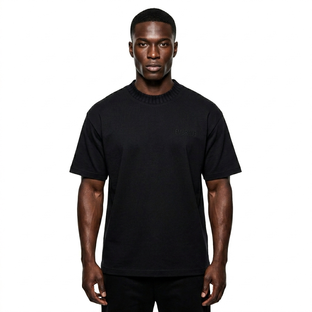 Heavyweight Knitted T-Shirt worn by a athletic muscular Black male fashion influencer, gorpcore outdoor styling, studio lookbook — custom heavyweight knitted t-shirt