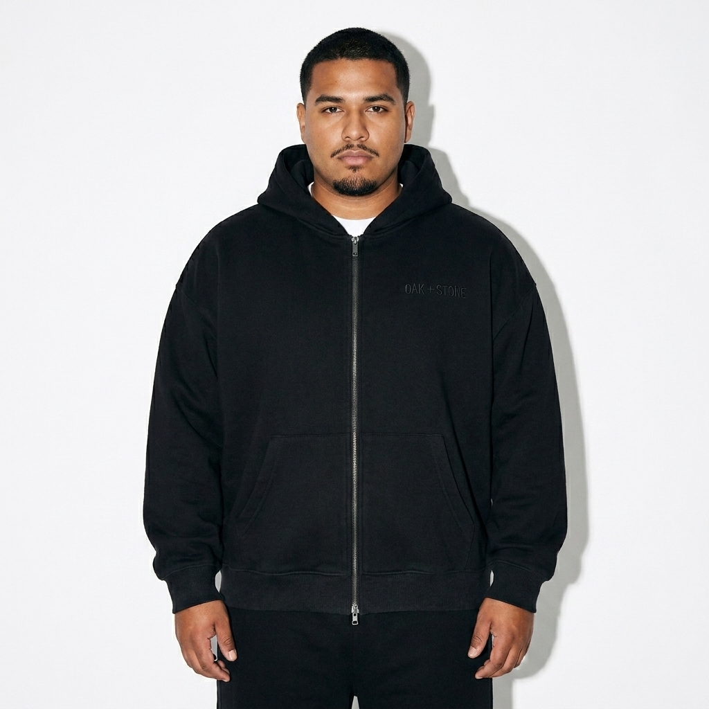 Heavyweight Pocket Hoodie worn by a curvy Latino male fashion influencer, sporty athleisure styling, studio lookbook — custom heavyweight pocket hoodie