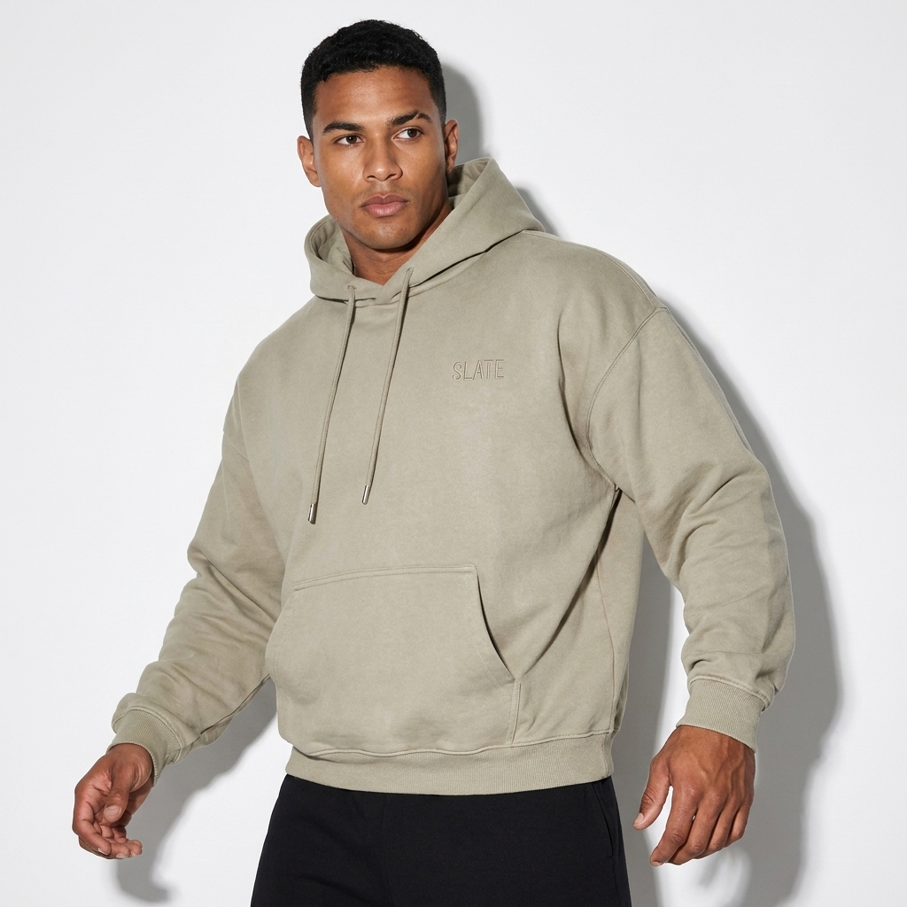 Heavyweight Pullover Hoodie worn by a athletic muscular Brazilian male fashion influencer, y2k revival styling, studio lookbook — custom heavyweight pullover hoodie