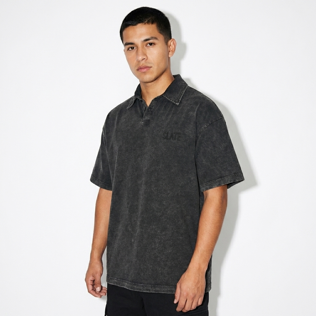Heavyweight Snow-Washed Polo T-Shirt worn by a petite Mexican male fashion influencer, sporty athleisure styling, studio lookbook — custom heavyweight snow-washed polo t-shirt