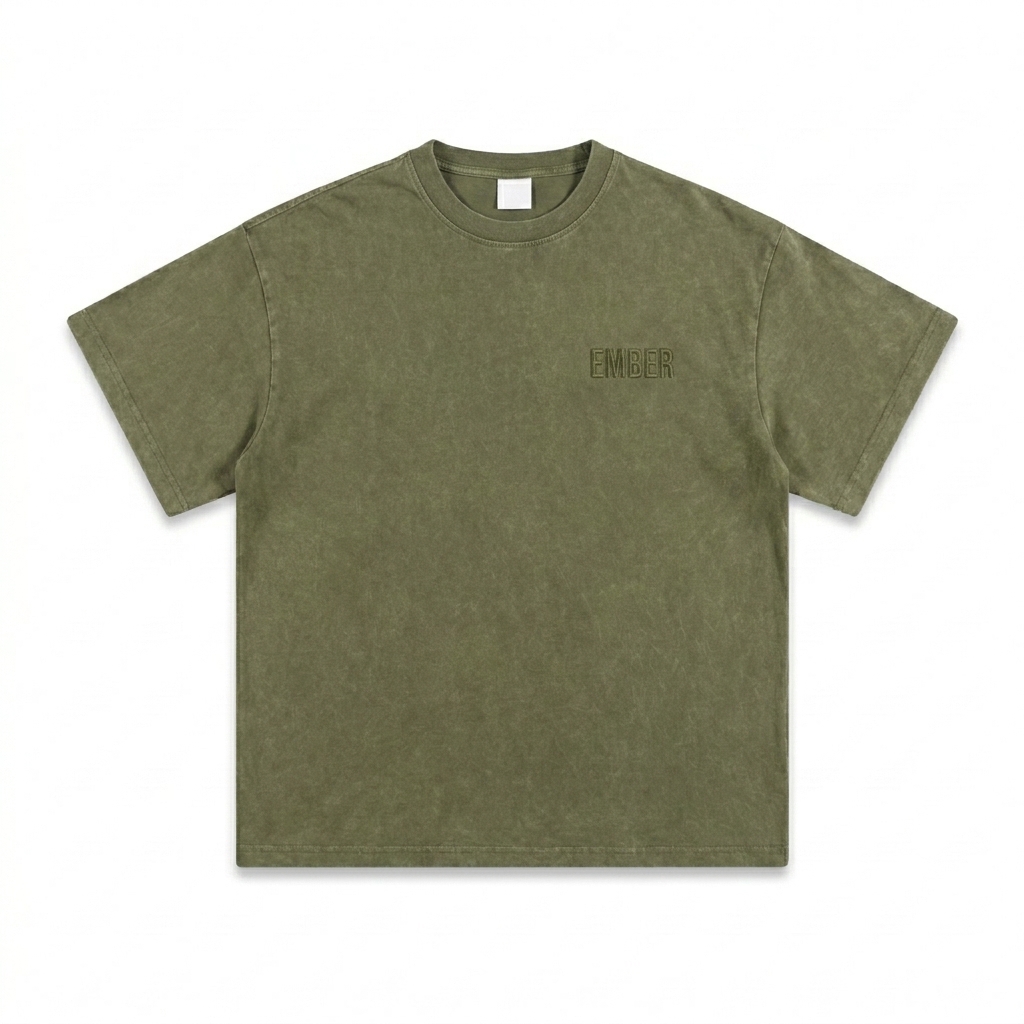 Custom Heavyweight Snow Washed T-Shirt design direction 1: Tonal Minimalist Wordmark featuring the EMBER wordmark