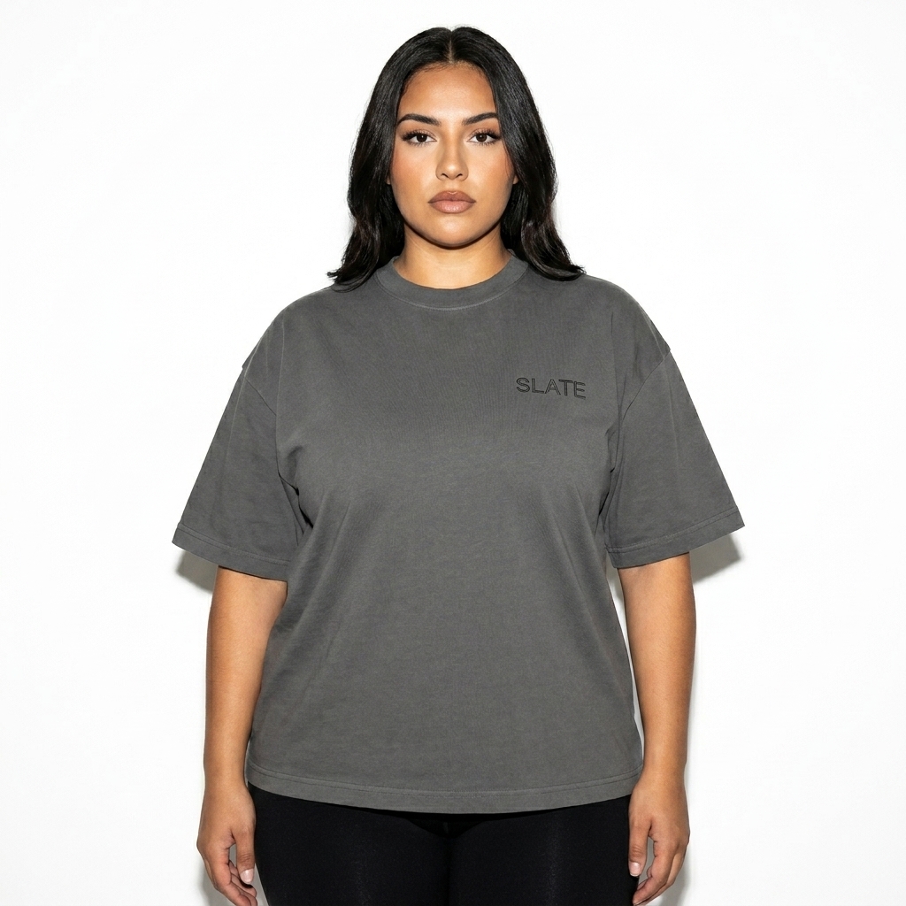 Heavyweight Vintage Washed T-Shirt worn by a curvy Hispanic female fashion influencer, sporty athleisure styling, studio lookbook — custom heavyweight vintage washed t-shirt