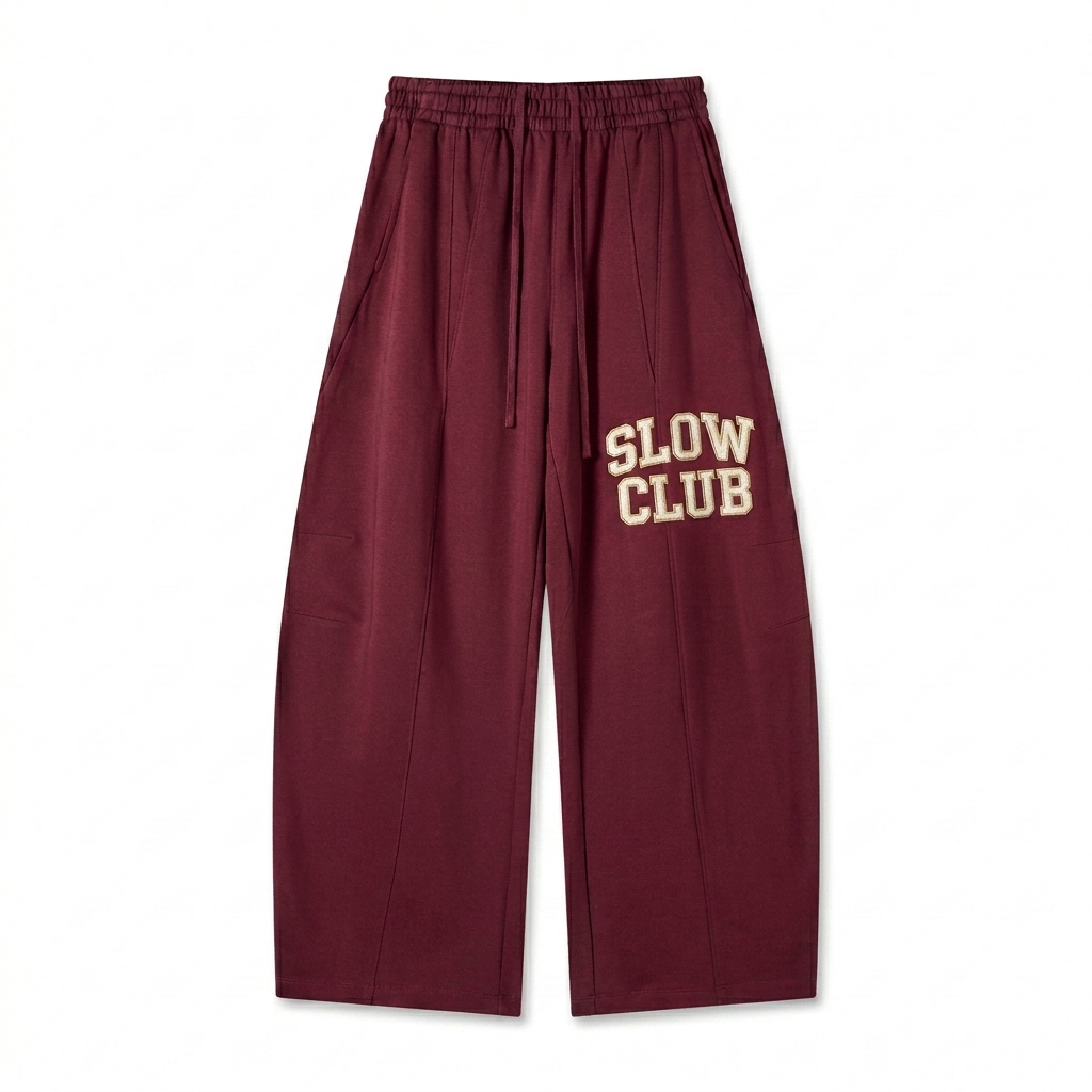 Custom Heavyweight Wide Leg Sweatpants design direction 3: Retro Collegiate Emblem featuring the SLOW CLUB wordmark