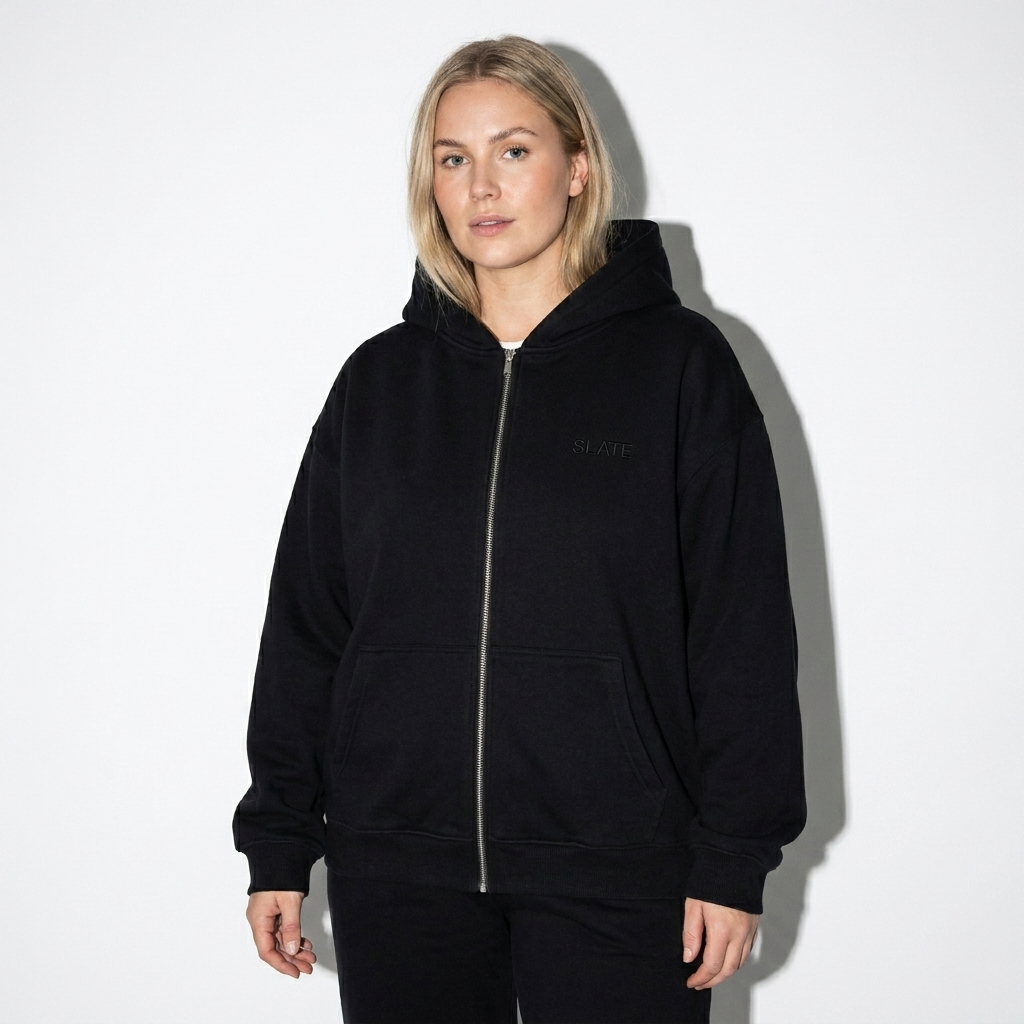 Custom Heavyweight Zip-Up Hoodie worn by a mid-size Scandinavian female fashion influencer, downtown streetwear styling, studio lookbook — custom custom heavyweight zip-up hoodie