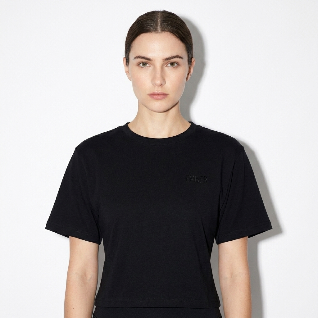 Lightweight Cocoon Short Sleeve Top worn by a broad-shouldered White European female fashion influencer, workwear utility styling, studio lookbook — custom lightweight cocoon short sleeve top