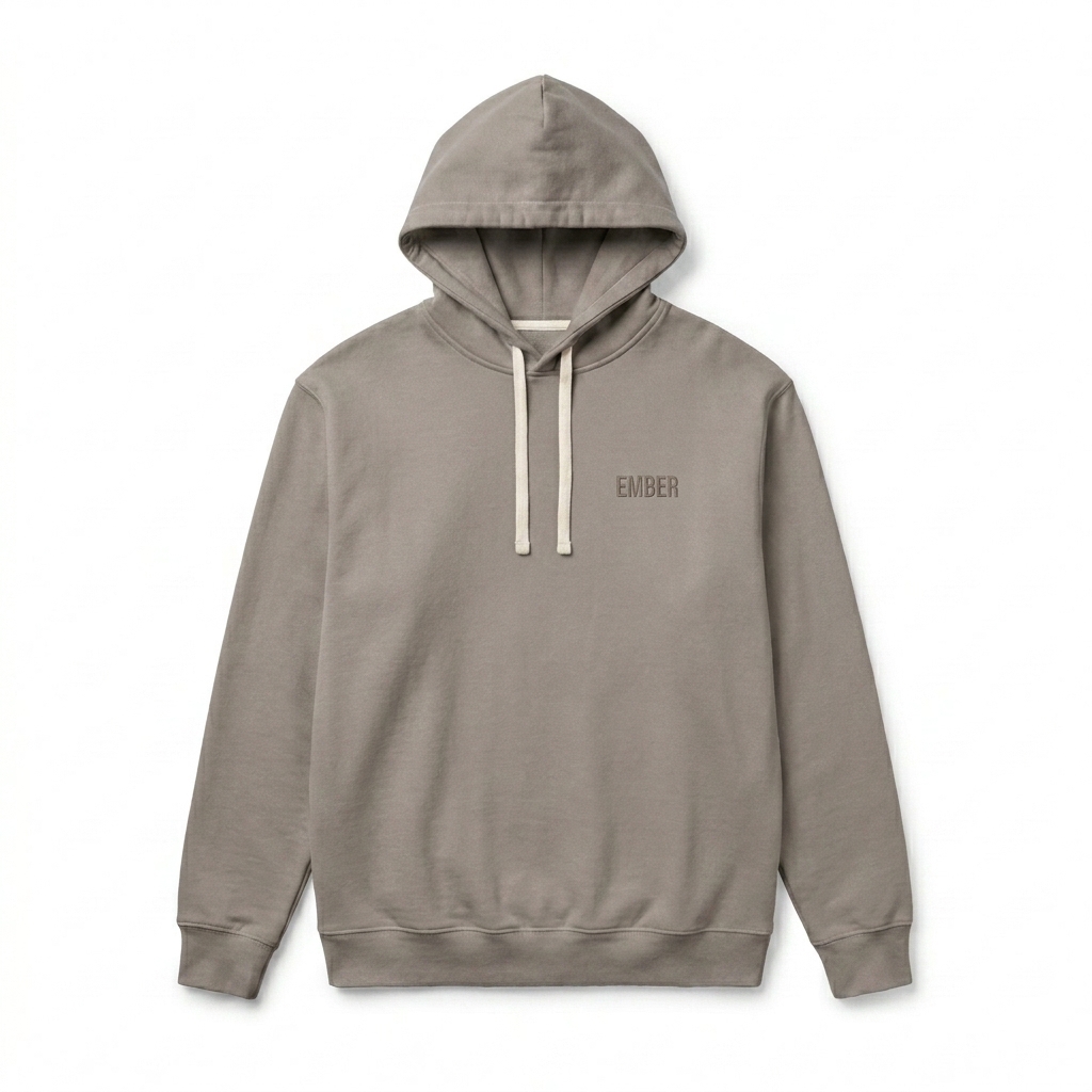 Custom Unisex Garment-Dyed Lightweight Hoodie design direction 1: Tonal Minimalist Wordmark featuring the EMBER wordmark