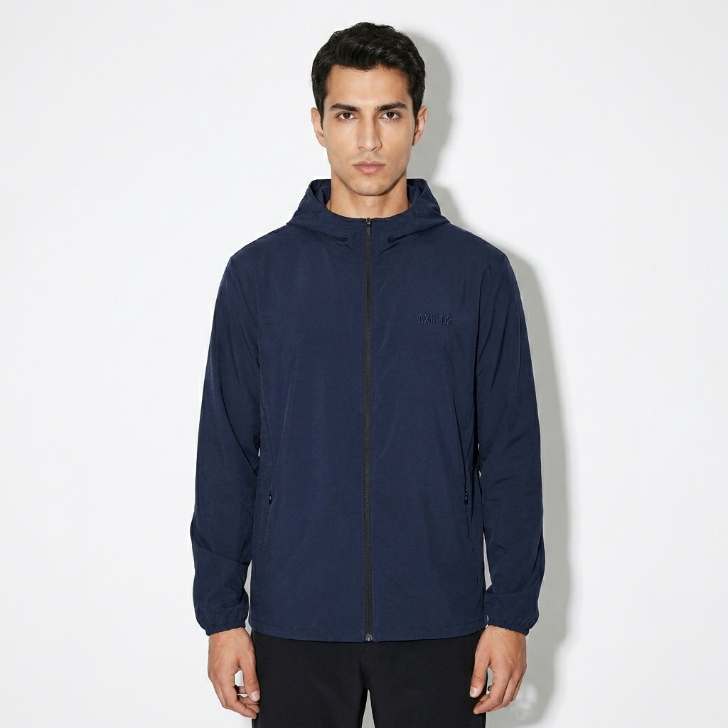 Lightweight Hooded Sports Jacket worn by a lean Turkish male fashion influencer, minimalist luxury styling, studio lookbook — custom lightweight hooded sports jacket