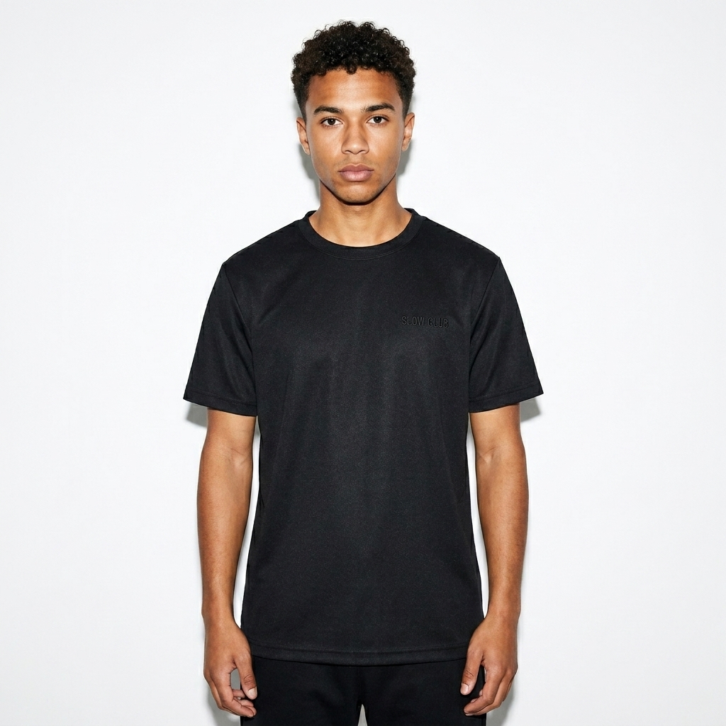 Lightweight Performance Crewneck T-Shirt worn by a petite Mixed-race male fashion influencer, workwear utility styling, studio lookbook — custom lightweight performance crewneck t-shirt
