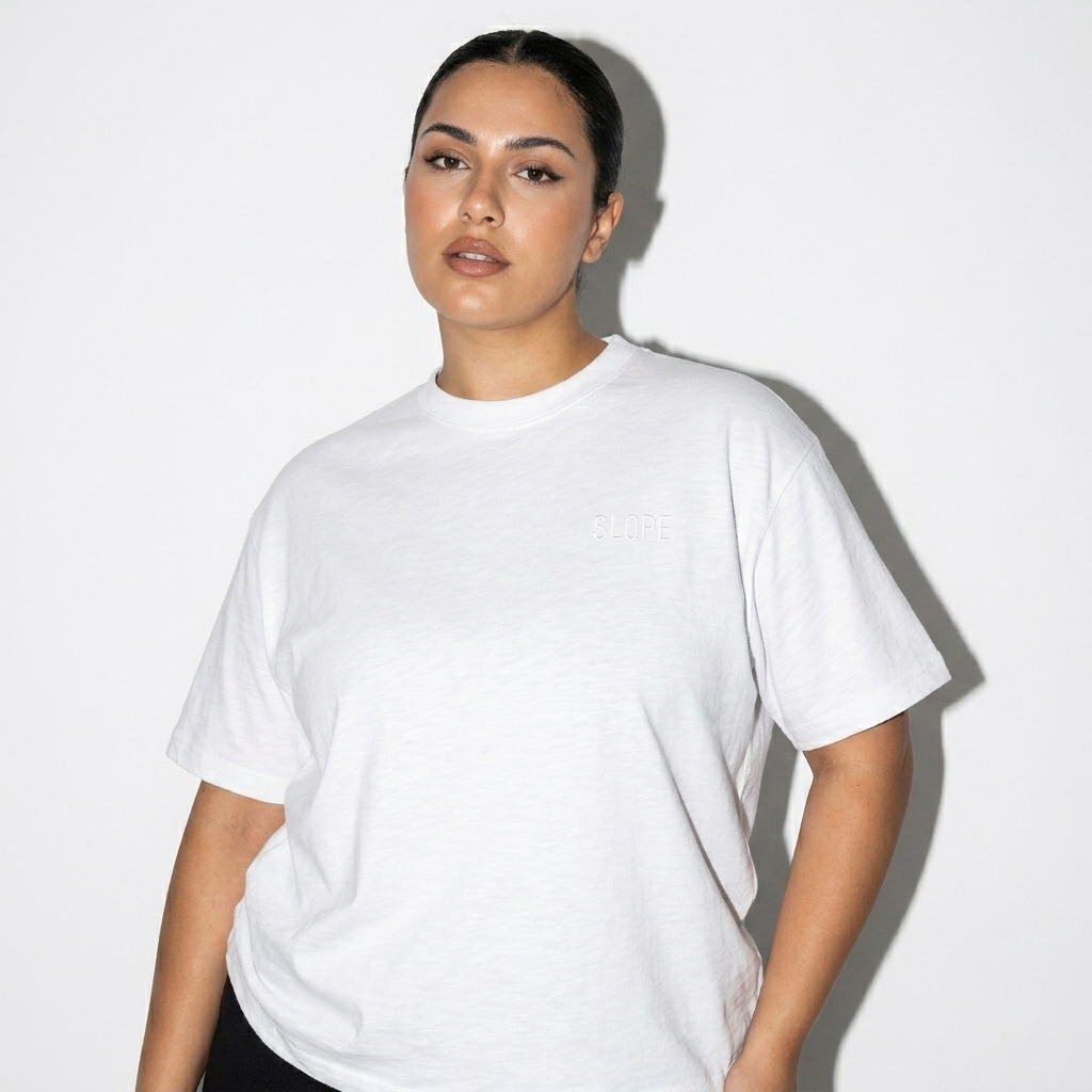 Lightweight Slub Cotton T-Shirt worn by a curvy Turkish female fashion influencer, downtown streetwear styling, studio lookbook — custom lightweight slub cotton t-shirt