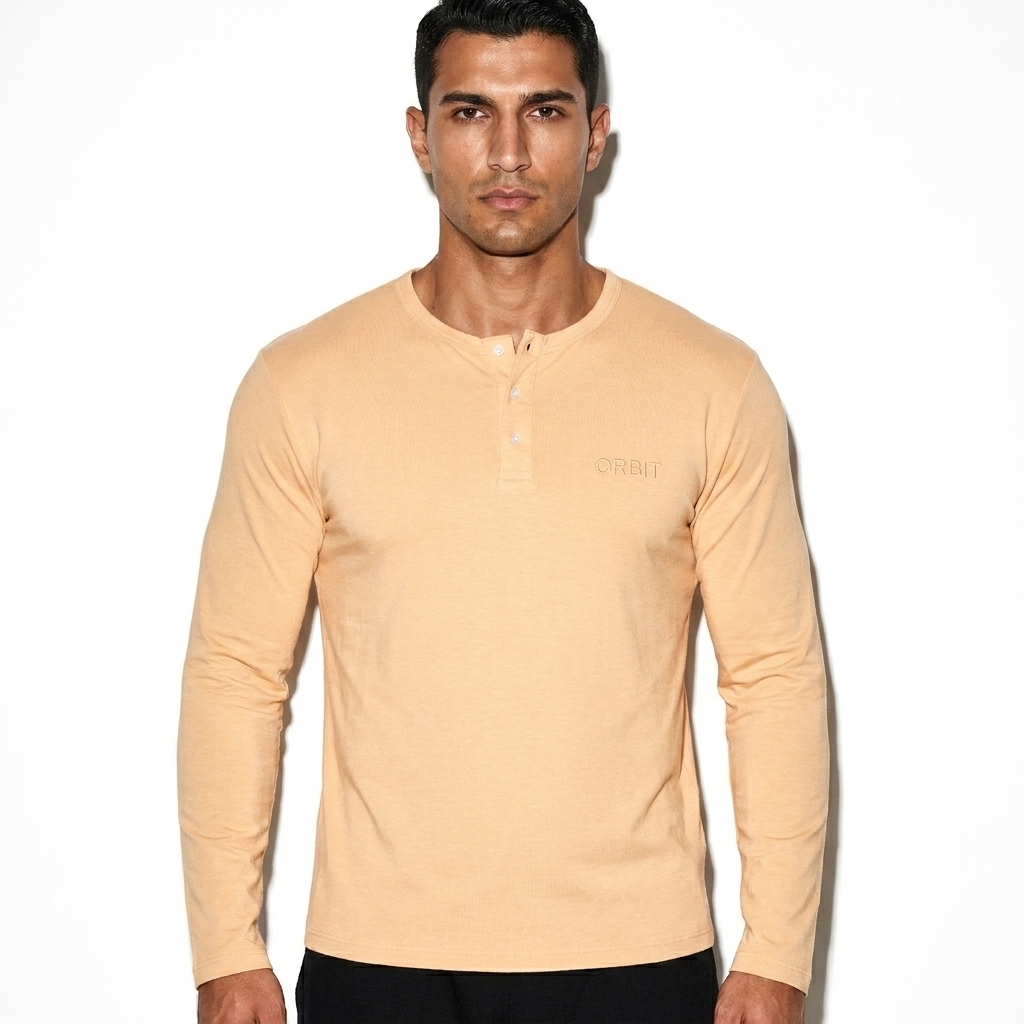 Long Sleeve Henley T-Shirt worn by a athletic muscular Turkish male fashion influencer, minimalist luxury styling, studio lookbook — custom long sleeve henley t-shirt