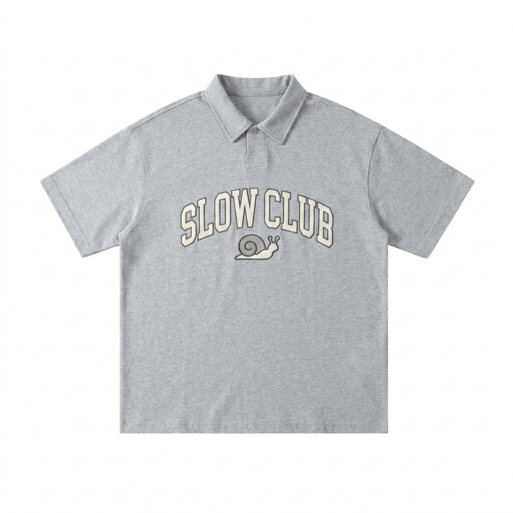 Custom Loose Cotton Polo Shirt design direction 3: Retro Collegiate Emblem featuring the SLOW CLUB wordmark
