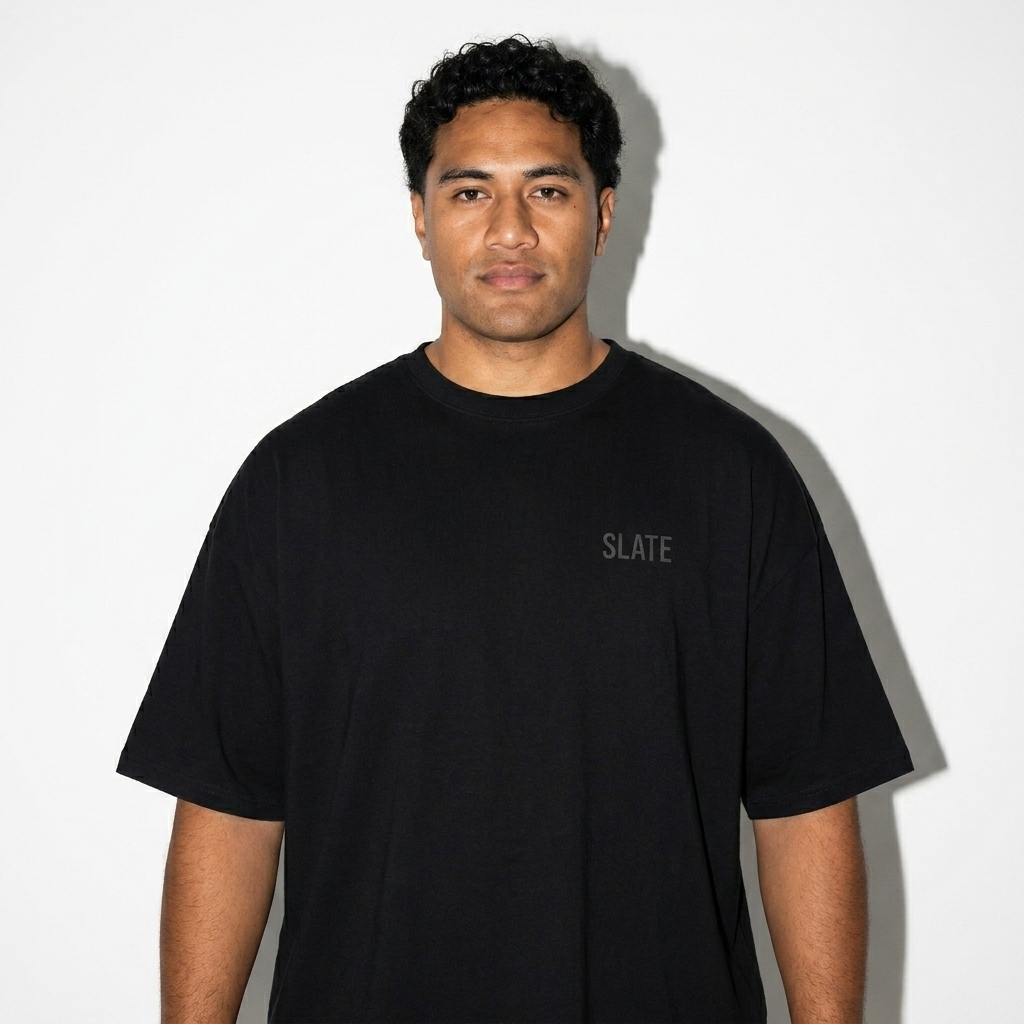 Loose Drop Shoulder T-Shirt worn by a mid-size Pacific Islander male fashion influencer, minimalist luxury styling, studio lookbook — custom loose drop shoulder t-shirt