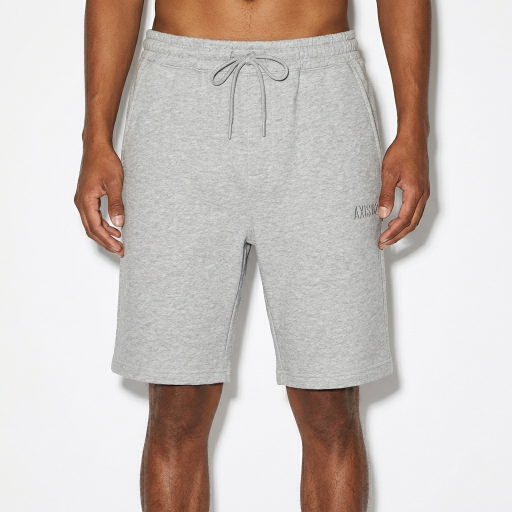 Men's Fleece Shorts worn by a slim tall Indigenous American male fashion influencer, minimalist luxury styling, studio lookbook — custom men's fleece shorts