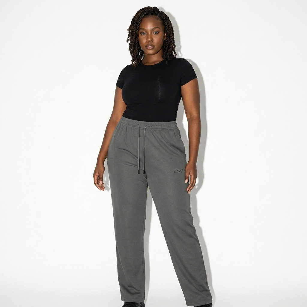 Mesh-Lined Athletic Pants worn by a curvy East African female fashion influencer, preppy ivy styling, studio lookbook — custom mesh-lined athletic pants