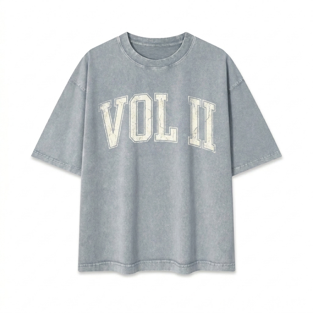 Custom Mineral Wash Boxy T-Shirt design direction 3: Retro Collegiate Emblem featuring the VOL II wordmark