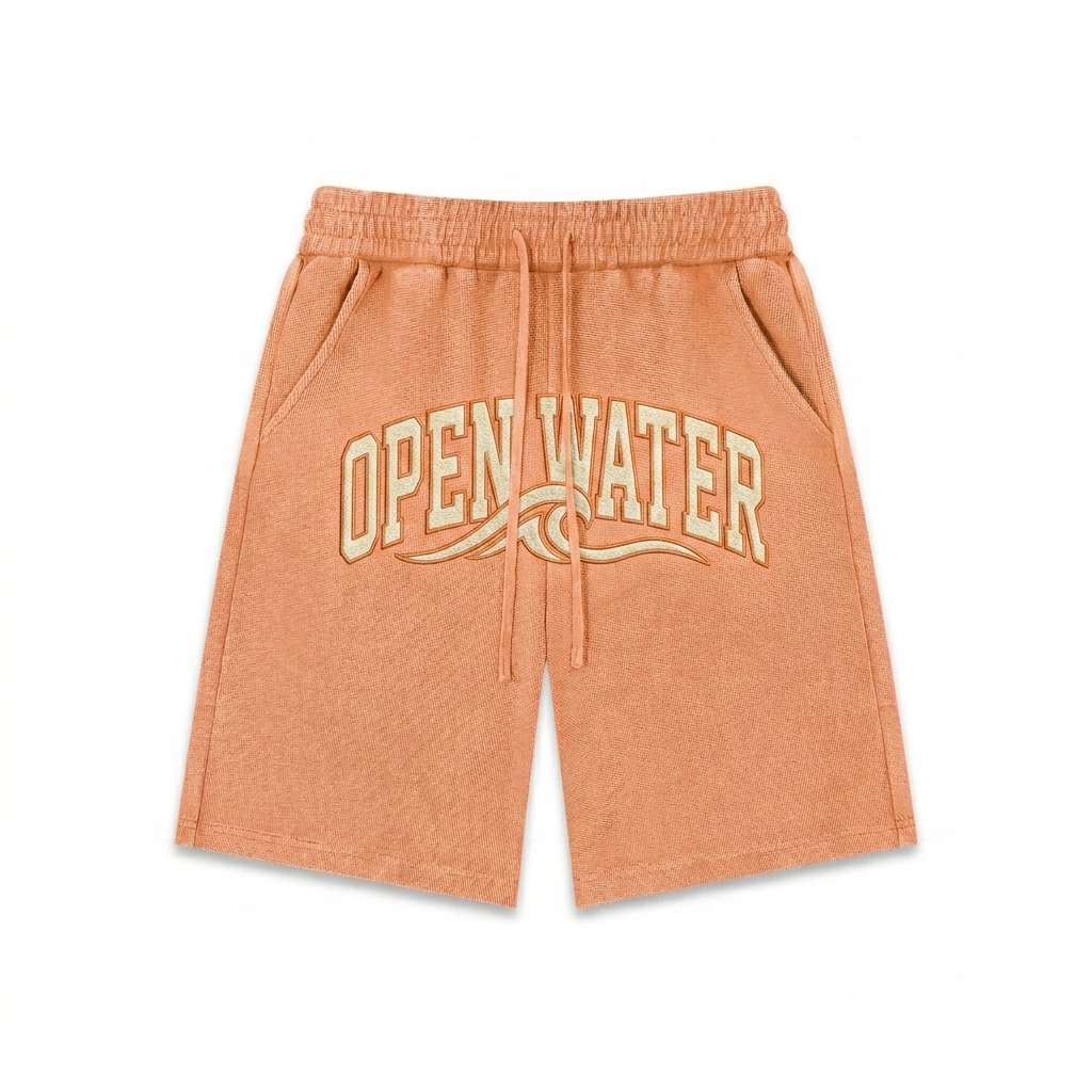 Custom Mineral Wash Waffle Knit Shorts design direction 3: Retro Collegiate Emblem featuring the OPEN WATER wordmark