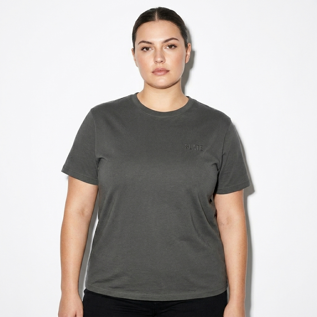Organic Mid-Lightweight T-Shirt worn by a curvy German female fashion influencer, editorial avant-garde styling, studio lookbook — custom organic mid-lightweight t-shirt