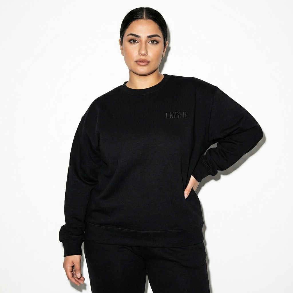 Organic Oversized Crewneck Sweatshirt worn by a mid-size Persian female fashion influencer, sporty athleisure styling, studio lookbook — custom organic oversized crewneck sweatshirt