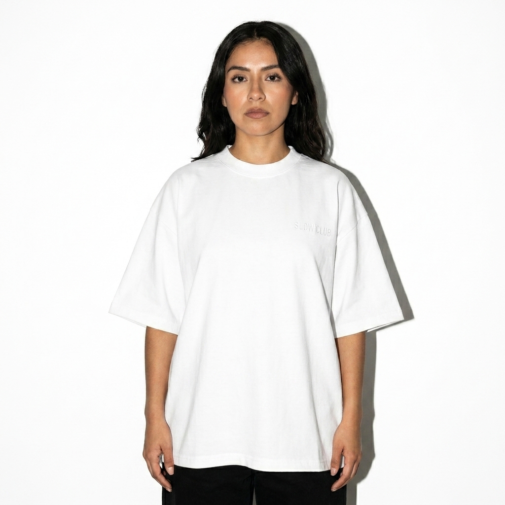 Oversized Boxy T-Shirt worn by a petite Mexican female fashion influencer, gorpcore outdoor styling, studio lookbook — custom oversized boxy t-shirt