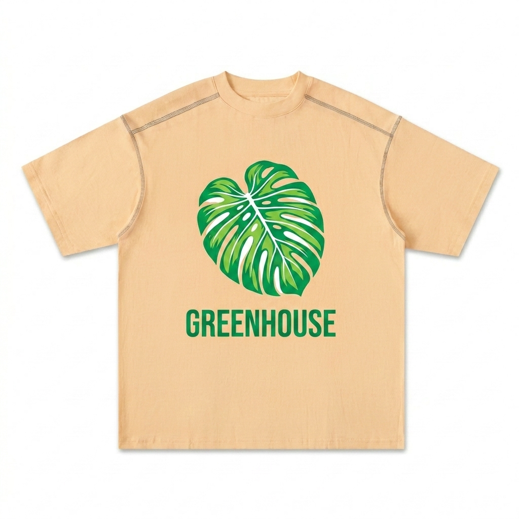 Custom Oversized Contrast-Stitched Cotton Tee design direction 2: Bold Botanical Graphic featuring the GREENHOUSE wordmark