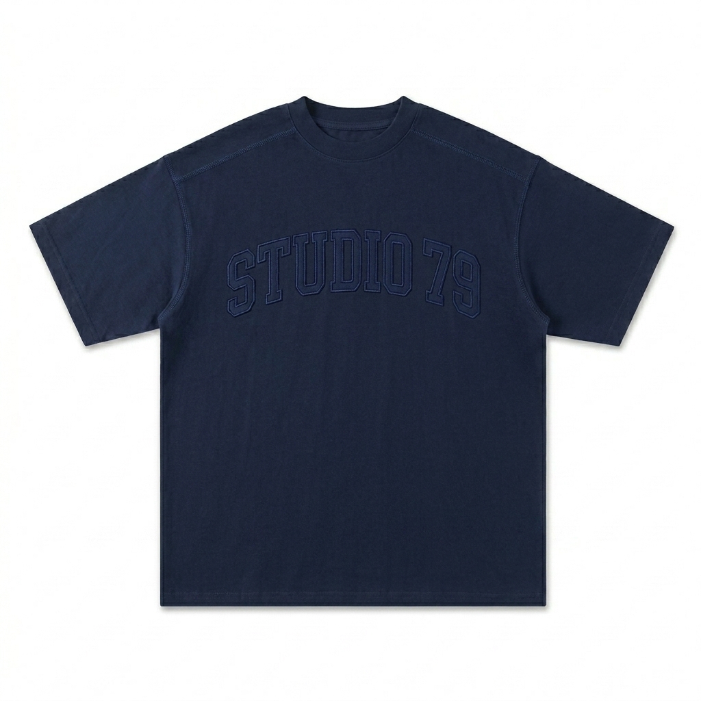 Custom Oversized Contrast-Stitched Cotton Tee design direction 3: Retro Collegiate Emblem featuring the STUDIO 79 wordmark