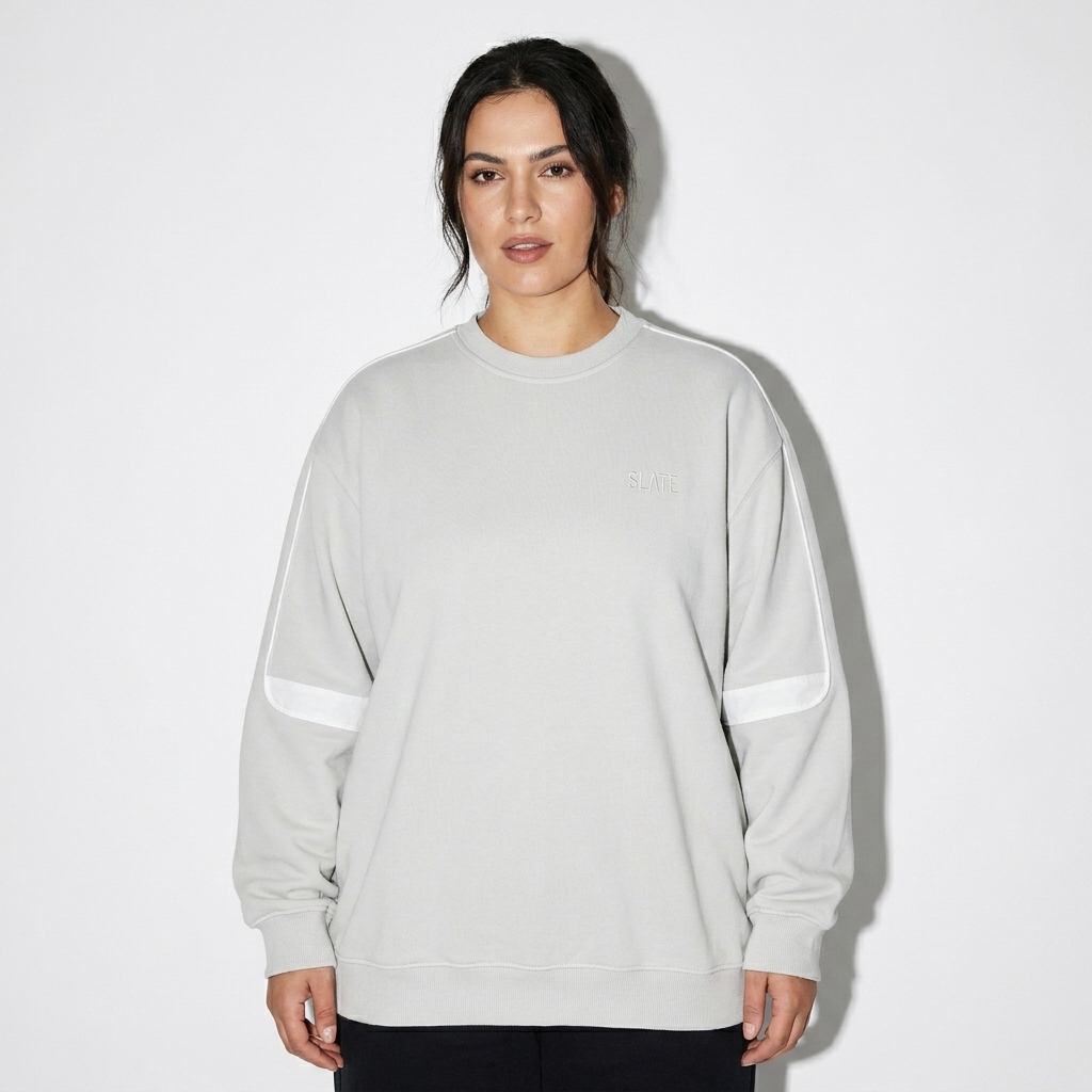Oversized Crewneck Sweatshirt worn by a mid-size Eastern European female fashion influencer, workwear utility styling, studio lookbook — custom oversized crewneck sweatshirt