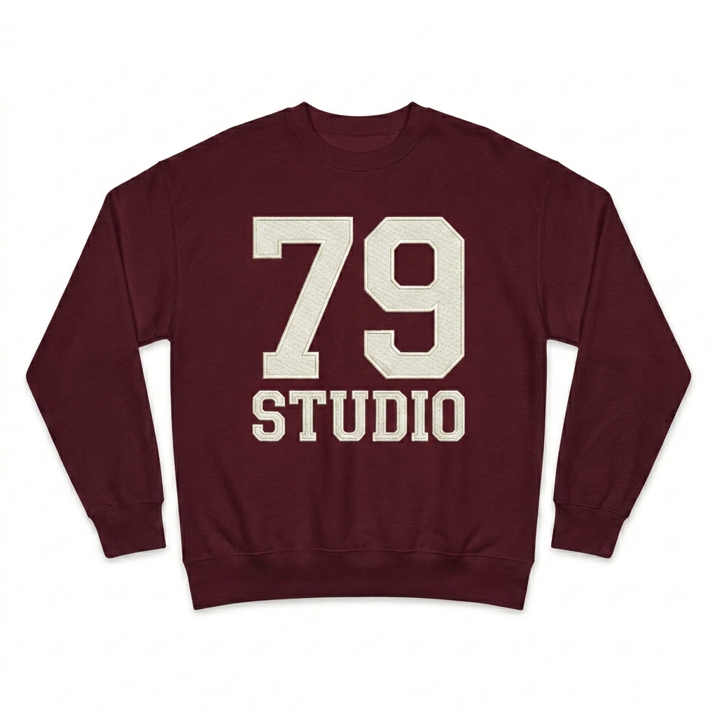 Custom Oversized Heavyweight Sweatshirt design direction 3: Retro Collegiate Emblem featuring the STUDIO 79 wordmark