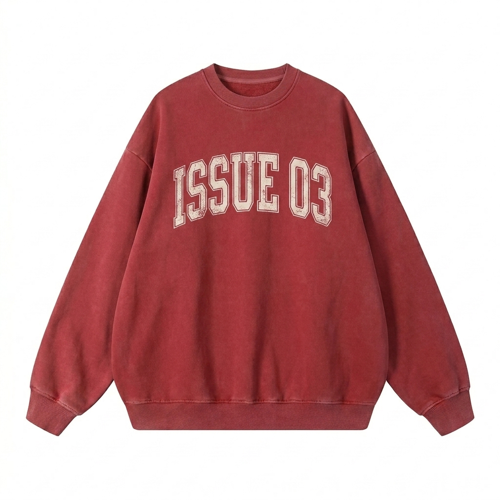Custom Oversized Snow Wash Sweatshirt design direction 3: Retro Collegiate Emblem featuring the ISSUE 03 wordmark