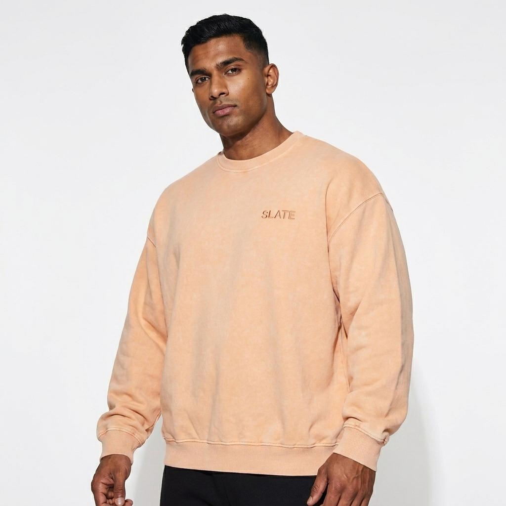 Oversized Snow Wash Sweatshirt worn by a athletic muscular South Asian male fashion influencer, techwear modern styling, studio lookbook — custom oversized snow wash sweatshirt