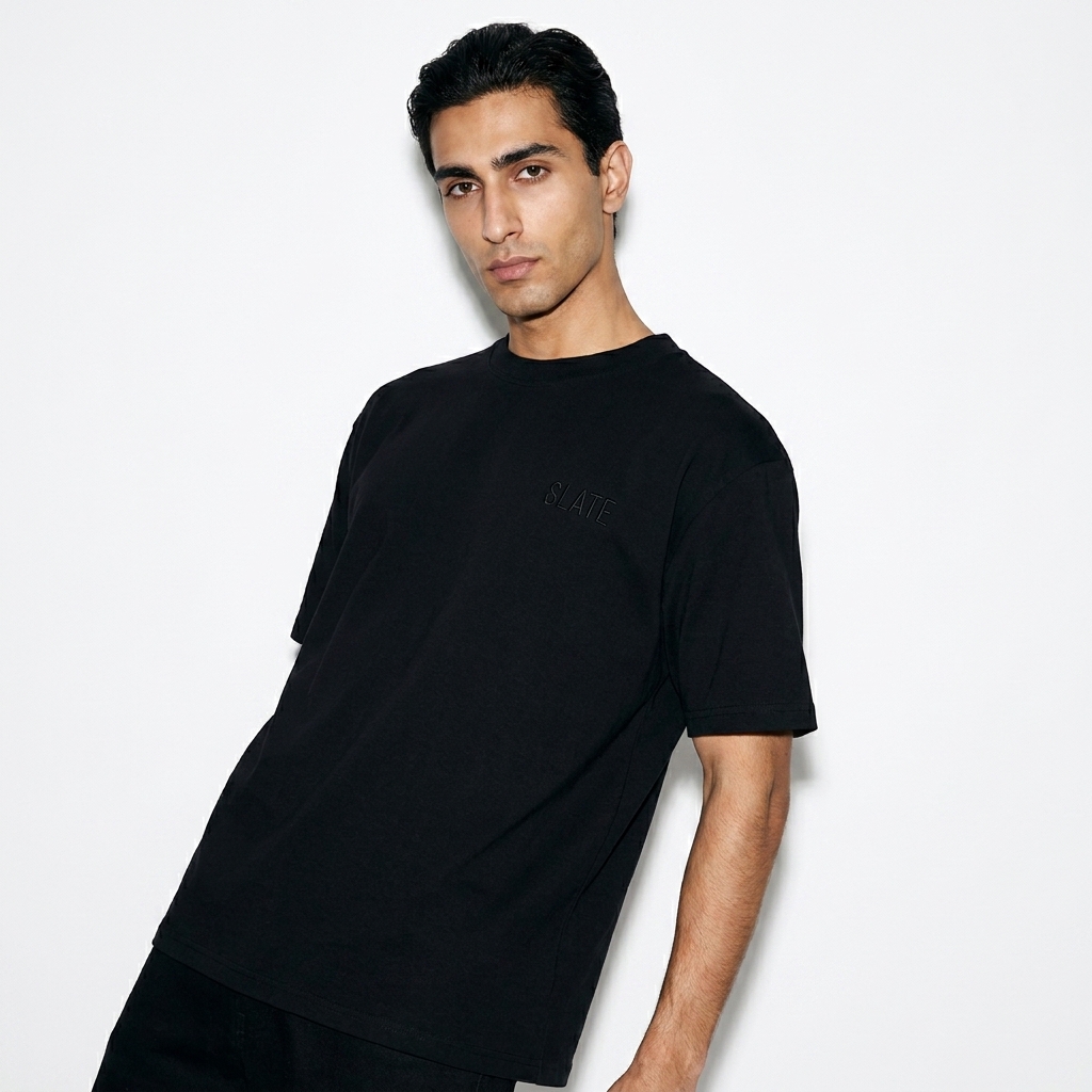 Oversized Tie-Dye T-Shirt worn by a lean Persian male fashion influencer, gorpcore outdoor styling, studio lookbook — custom oversized tie-dye t-shirt