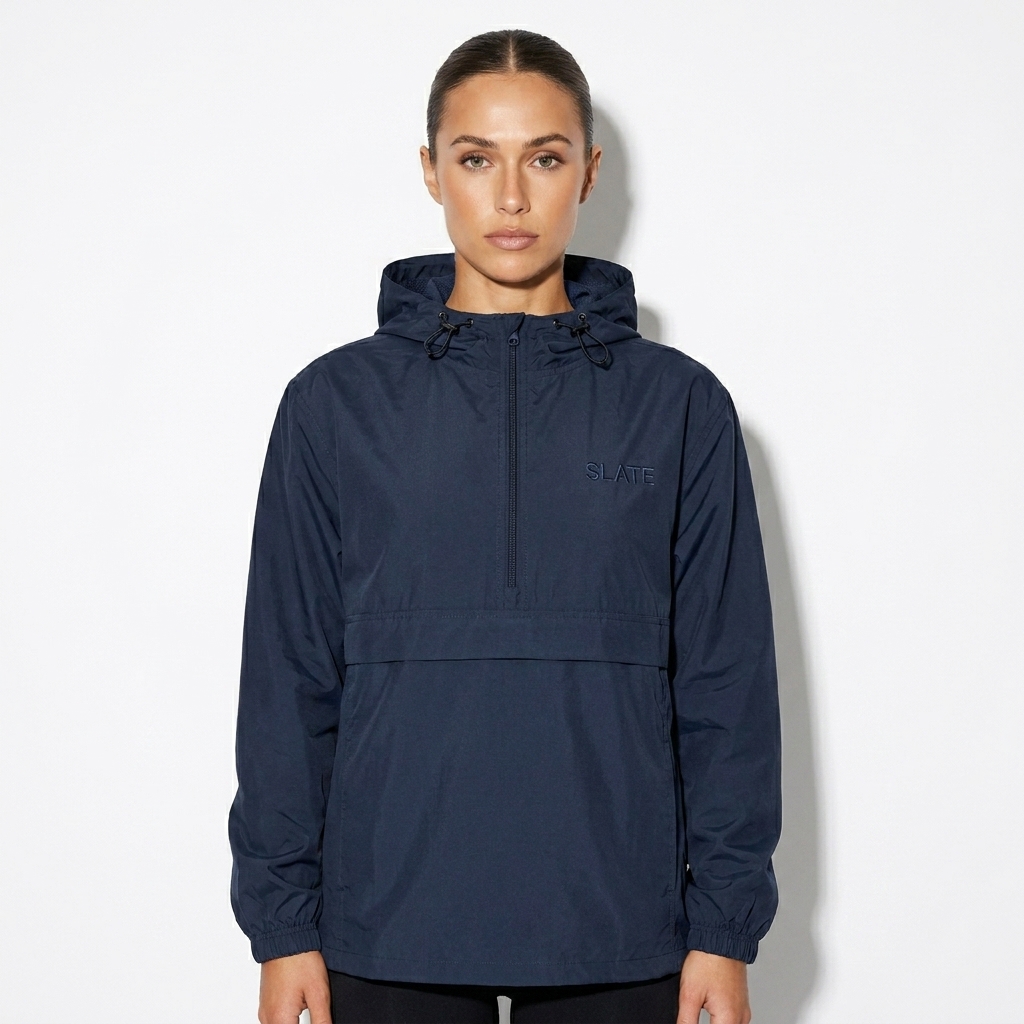 Packable Anorak Jacket worn by a toned Australian female fashion influencer, sporty athleisure styling, studio lookbook — custom packable anorak jacket