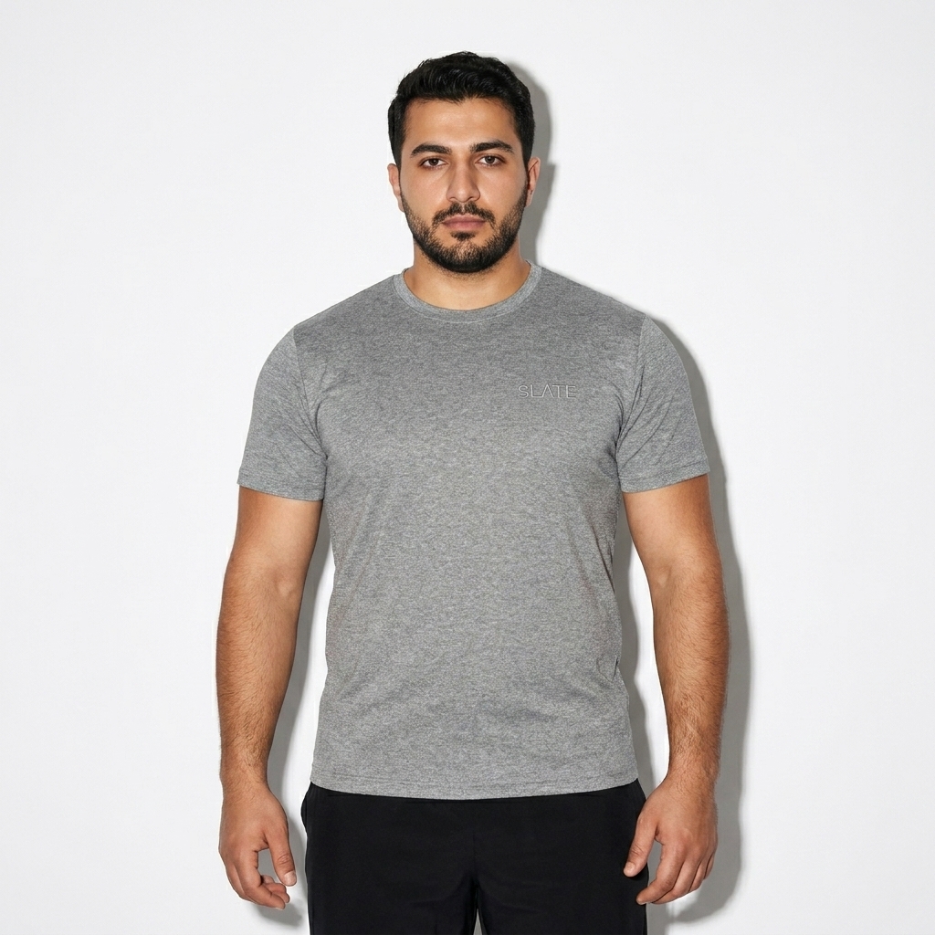 Performance Short-Sleeve T-Shirt worn by a curvy Turkish male fashion influencer, preppy ivy styling, studio lookbook — custom performance short-sleeve t-shirt