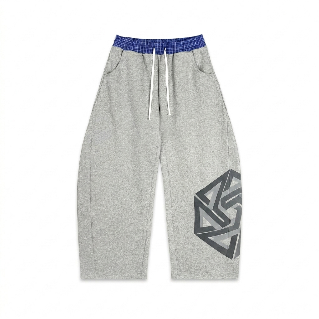 Custom Plaid Waistband Barrel Sweatpants design direction 2: Abstract Geometric Graphic featuring the ORBIT wordmark