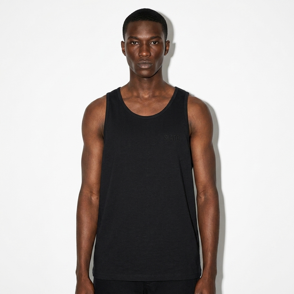 Premium Custom Tank Top worn by a lean Black male fashion influencer, minimalist luxury styling, studio lookbook — custom premium custom tank top