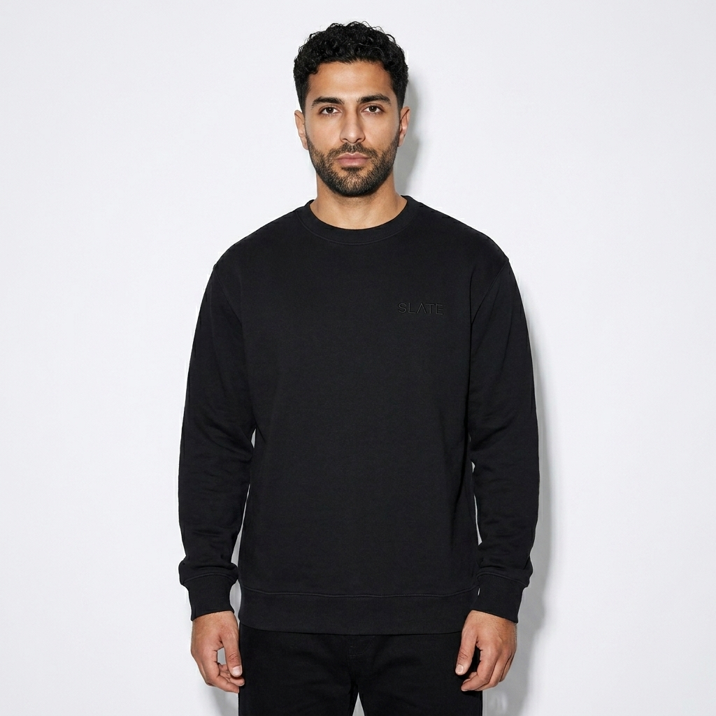 Unisex Premium Crew Neck Sweatshirt worn by a mid-size Persian male fashion influencer, techwear modern styling, studio lookbook — custom unisex premium crew neck sweatshirt