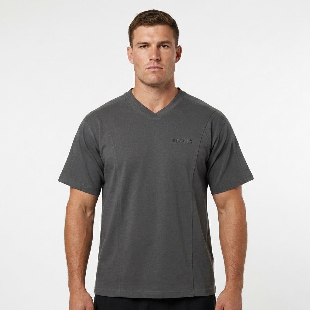 Performance V-Neck T-Shirt worn by a broad-shouldered Australian male fashion influencer, y2k revival styling, studio lookbook — custom performance v-neck t-shirt