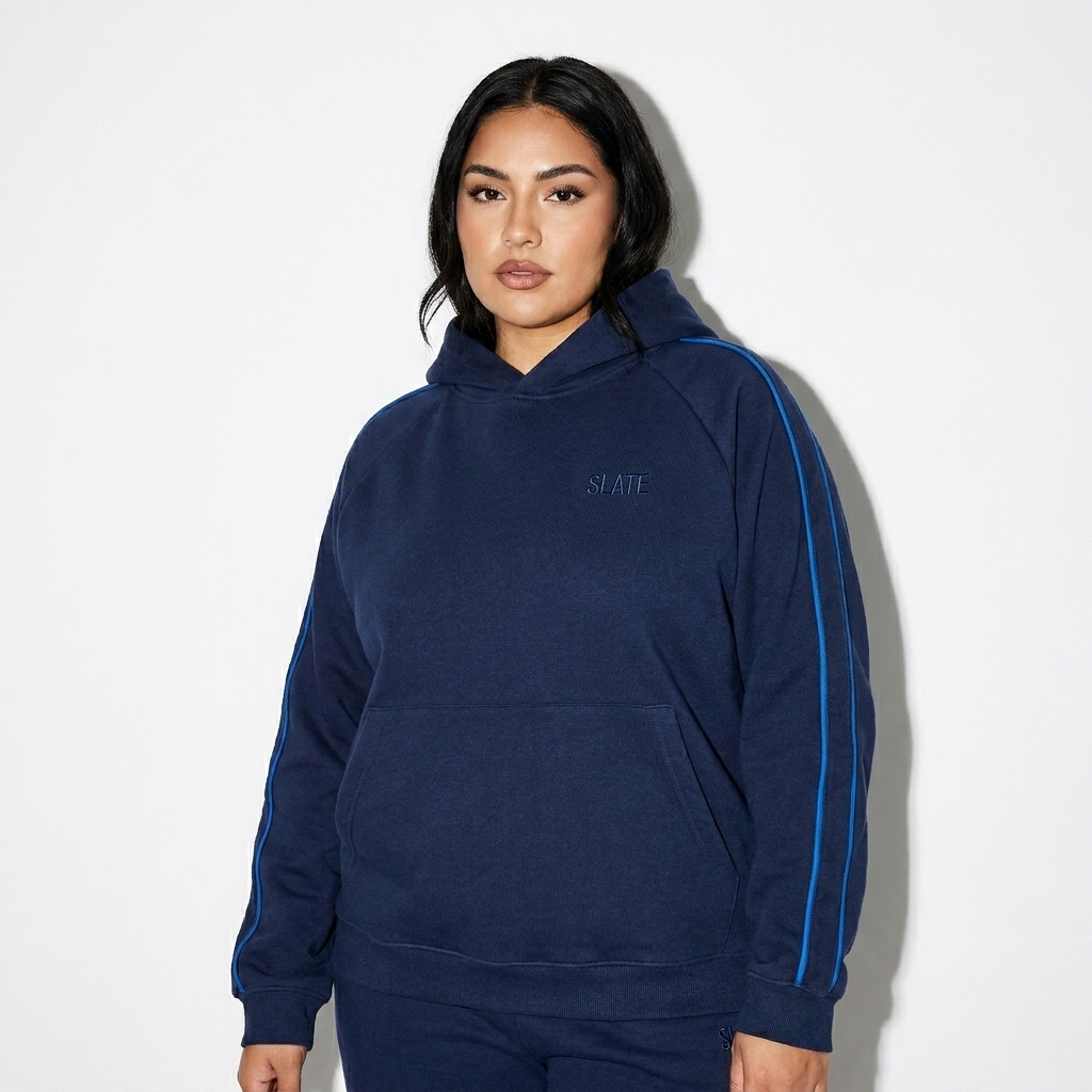 Raglan Contrast Piping Hoodie worn by a curvy Mexican female fashion influencer, preppy ivy styling, studio lookbook — custom raglan contrast piping hoodie